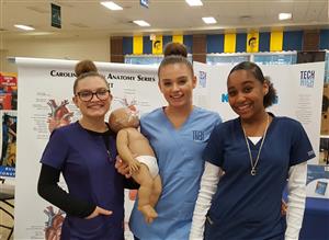 Students in Tech High's nursing program greet families 